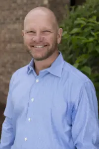 Dr. Gordon West